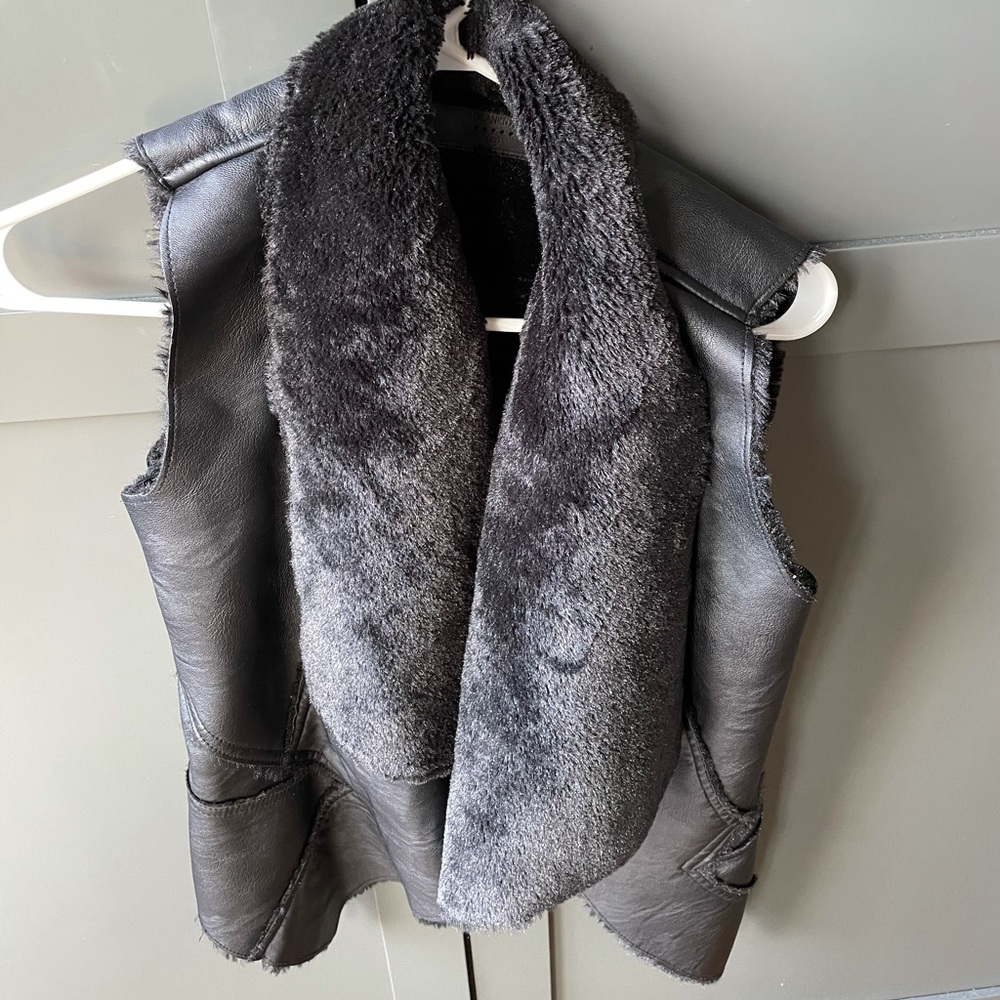 Leather and fur vest